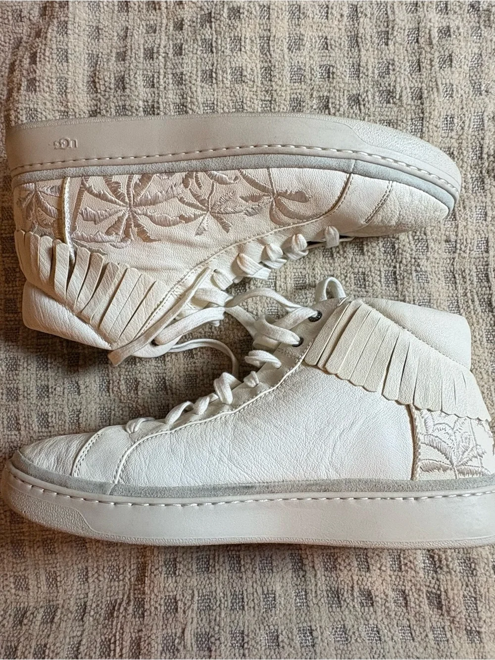 UGG Cream Leather High-Top Sneakers with Fringe